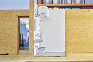  Die Module enthalten ein komplettes Bad mit Waschbecken, WC, Warmwasserboiler, Bodenwanne und Dusche 