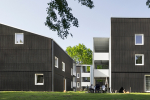  Die von Holzbau Weizenegger vor über einem Jahr in Ostfildern in Holzrahmenbauweise fertig gestellten Unterkünfte für Flüchtlinge und Obdachlose Foto: DAM / Markus Guhl 