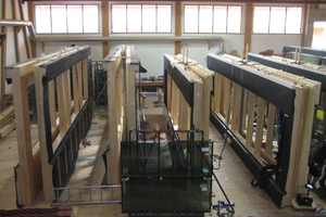  Die Fassadenelemente wurden bei der Ambros GmbH in Hopferau im Allgäu vorgefertigt Foto: Ambros 