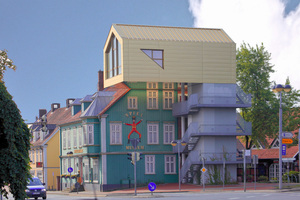  Güldener Glanz: Der Architekt wählte für die Konstruktion des Daches eine Kalzip Stehfalzdeckung in "Medium Gold G30" Foto: Kalzip  