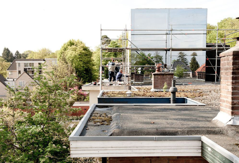 aufgestockt und verspiegelt dach holzbau