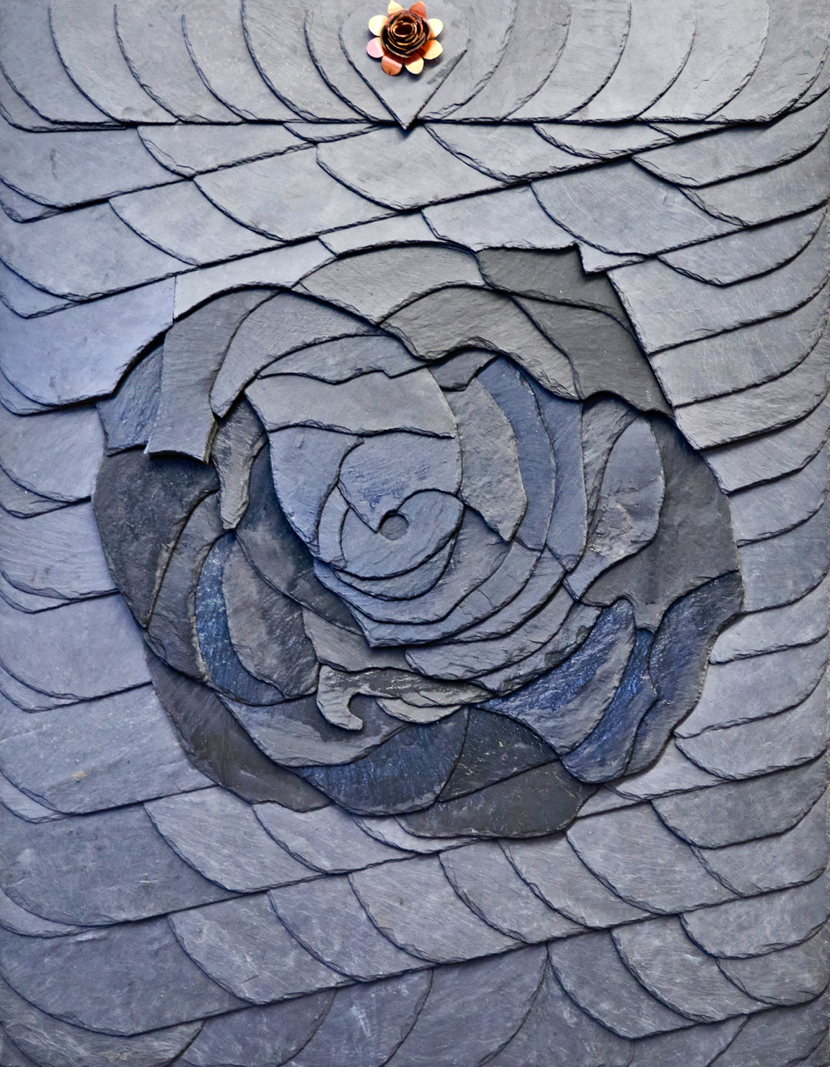 Kleine Ornamente aus Schiefer - dach+holzbau