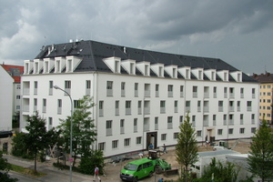 Gerade bei Blockrandbebauungen gibt es oft gerundete Dachflächen, wie an diesem Gebäudeensemble in München 