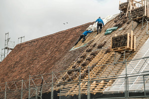  Neudeckung des Daches mit Ziegeln aus dem Bestand 