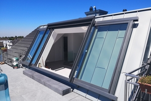  Die "Lideko"-Dachschiebefenster lassen sich auch als Balkonausstiegsfenster einbauen, so wie hier im Dach eines Wohnhauses in Leverkusen 