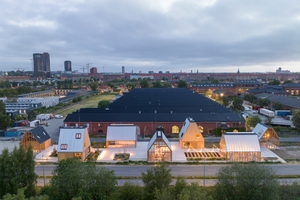  Im Rahmen des Projekts „Living Places“ entstanden auf dem Gelände eines stillgelegten Güterbahnhofs in Kopenhagen sieben Häuser in Holzbauweise 