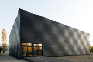 Deutscher Holzbaupreis 2013, Preisträger Kategorie „Neubau“
Temporäres Audimax der TU München in Garching 
Architekten: Deubzer König + Rimmel Architekten, München
Tragwerksplaner: bauart Konstruktions GmbH &amp; Co. KG, München 
Holzbau: Merkle GmbH, Bissingen und Teck 
 